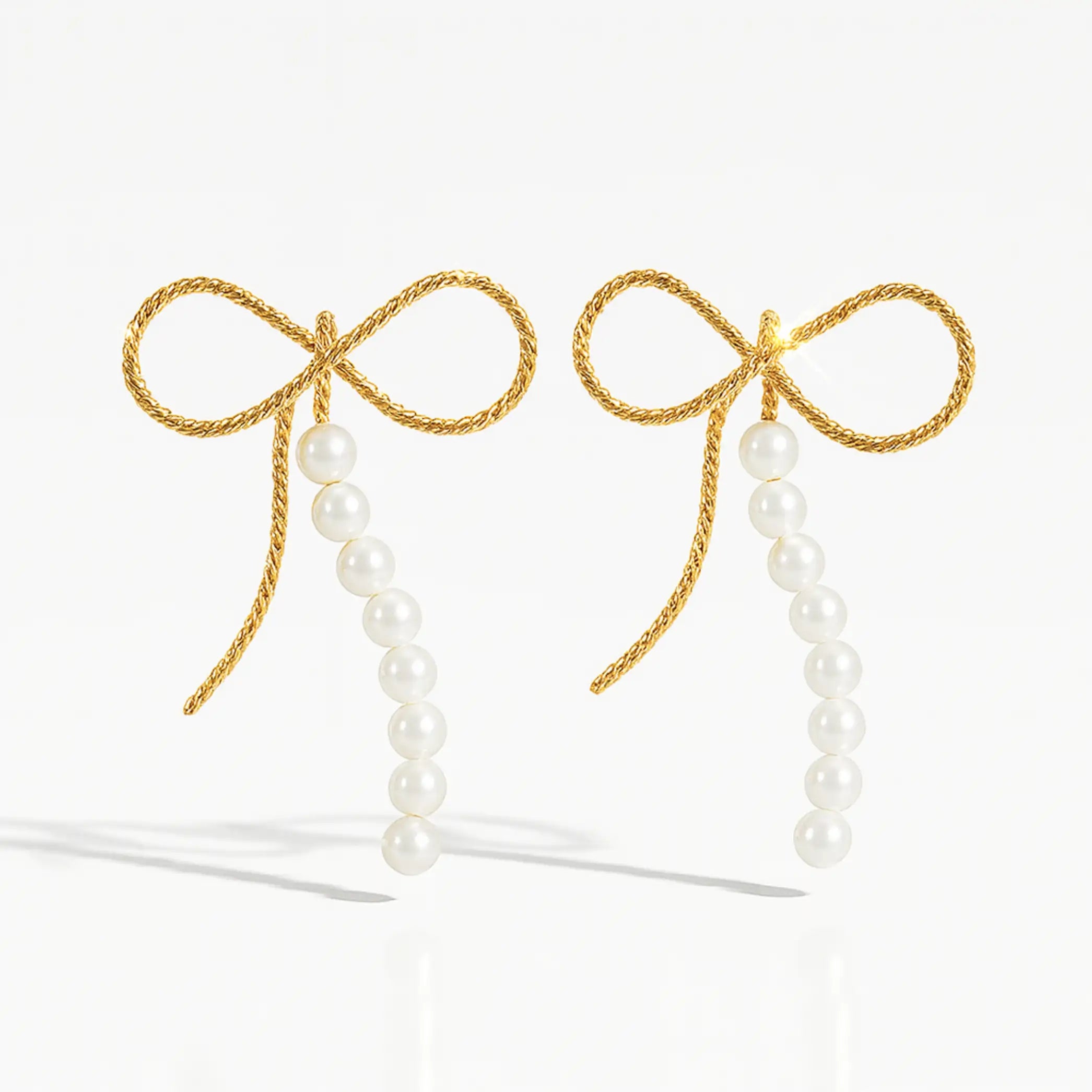 Gold Bow Pearl Tassel Earrings